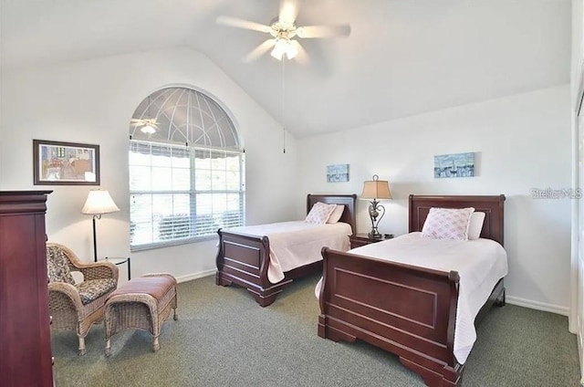 bedroom featuring baseboards, lofted ceiling, carpet, and a ceiling fan