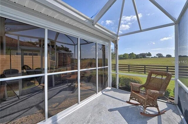 sunroom with a rural view