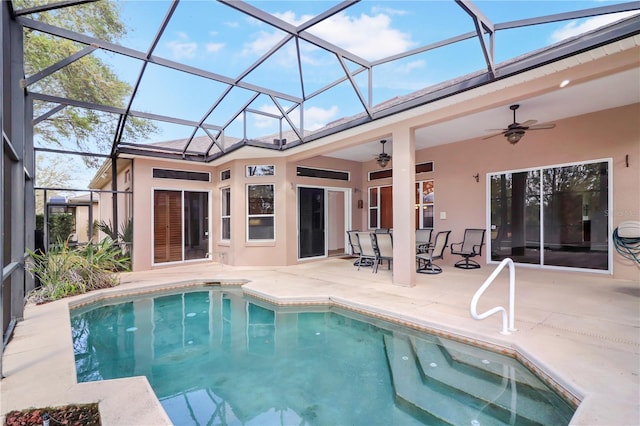 pool featuring a patio, a lanai, and ceiling fan