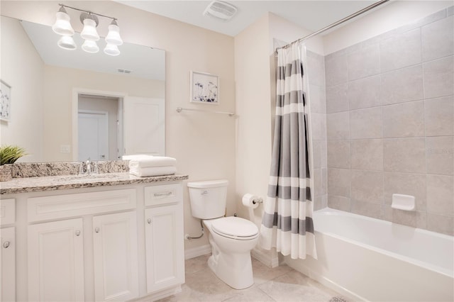 bathroom with visible vents, vanity, toilet, and shower / tub combo