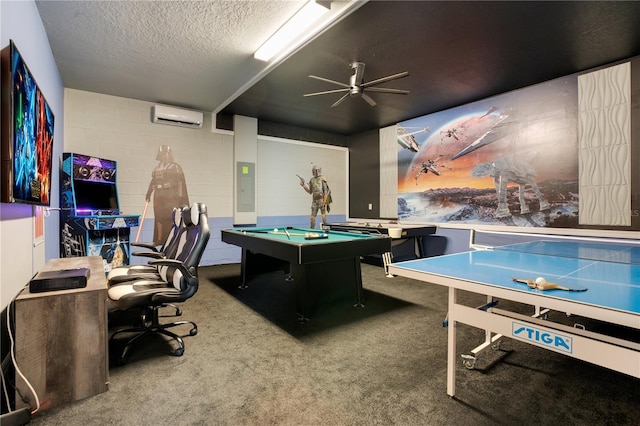 recreation room featuring electric panel, a textured ceiling, a wall unit AC, concrete block wall, and carpet flooring