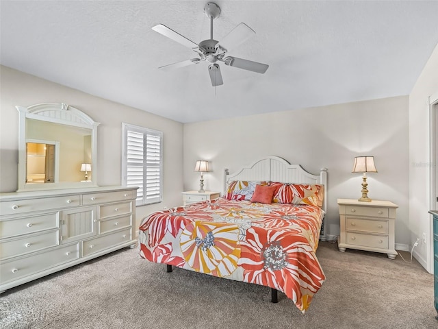 carpeted bedroom featuring a ceiling fan