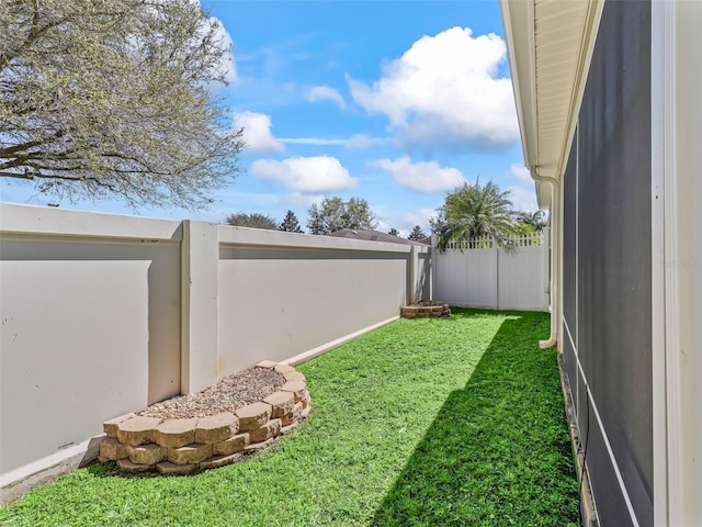 view of yard featuring a fenced backyard