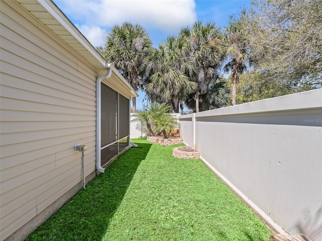 view of yard with fence