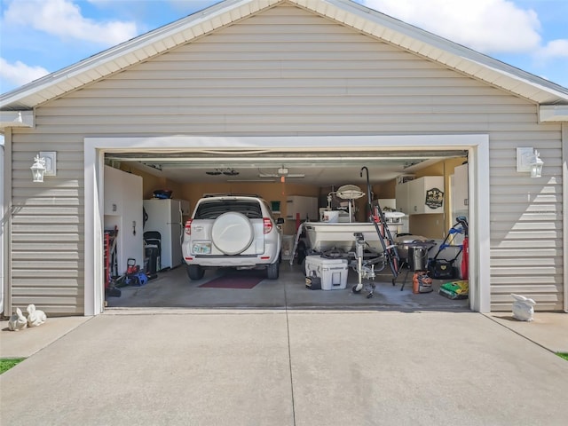 garage with freestanding refrigerator