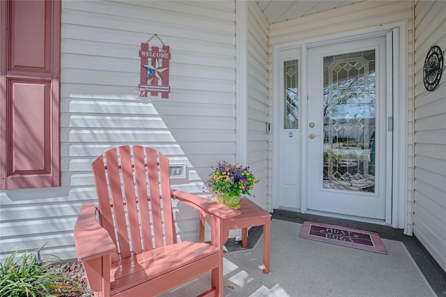 property entrance featuring covered porch