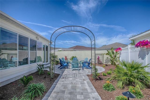 view of patio with fence