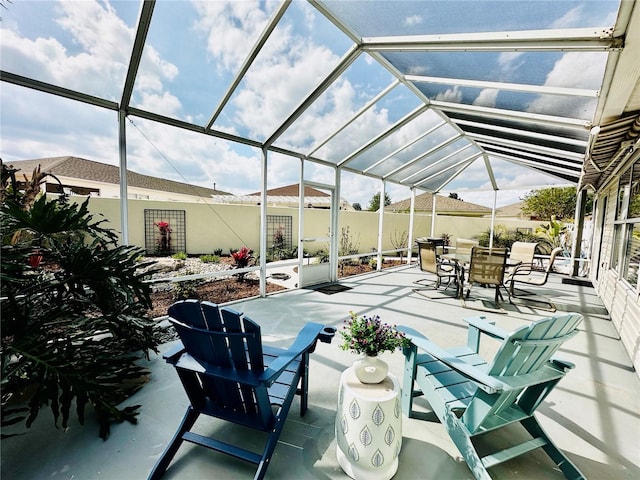 view of patio with a lanai