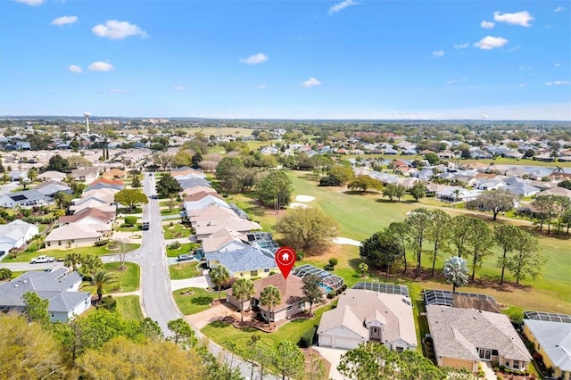 birds eye view of property with a residential view