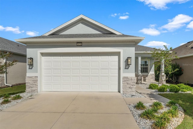 2174 Wallingford Loop, Mount Dora, FL 32757 - ranch-style house with stone siding, driveway, stucco siding, and a garage