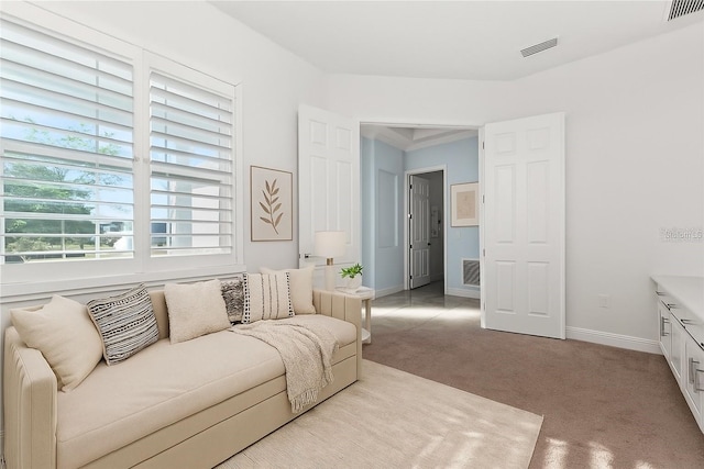 2174 Wallingford Loop, Mount Dora, FL 32757 - carpeted living area with baseboards