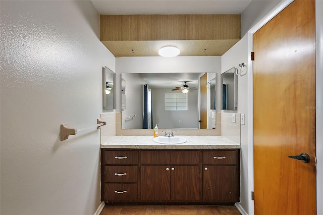 bathroom with vanity and ceiling fan