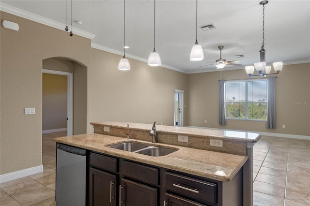 kitchen featuring a sink, open floor plan, arched walkways, crown molding, and dishwasher