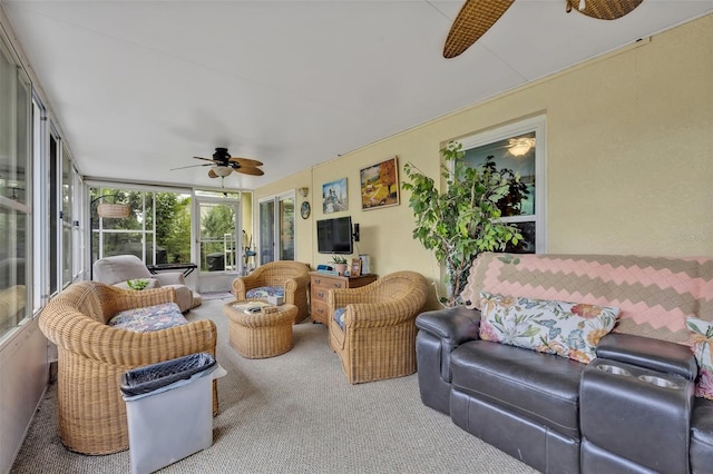 sunroom / solarium with ceiling fan