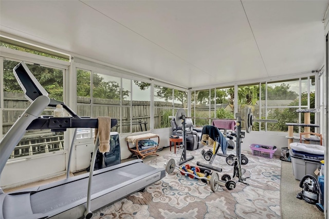 workout room featuring plenty of natural light