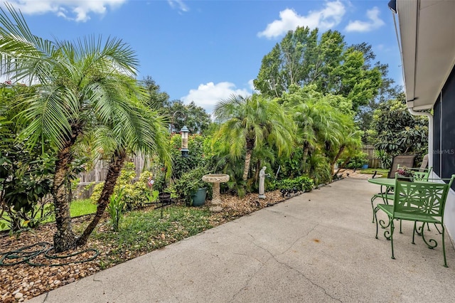 view of patio / terrace featuring fence