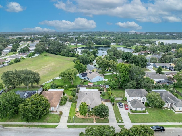 bird's eye view with a residential view and a water view