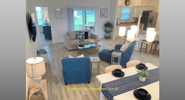 living area featuring light wood-type flooring