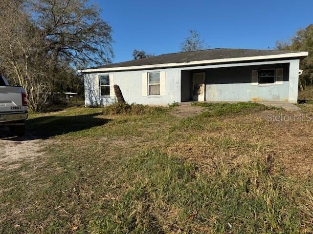 view of front of home with a front yard