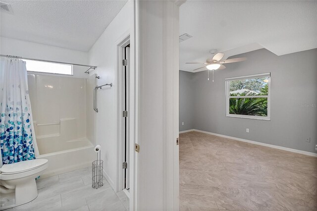 full bathroom featuring visible vents, toilet, a textured ceiling, shower / bath combination with curtain, and baseboards