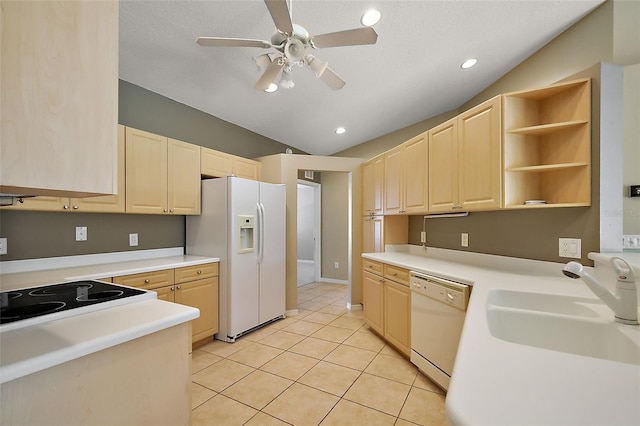 5359 Compass Pt, Oxford, FL 34484 - kitchen with white appliances, vaulted ceiling, and light brown cabinetry