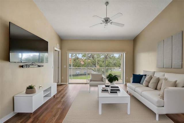 5359 Compass Pt, Oxford, FL 34484 - living area featuring wood finished floors, a ceiling fan, and baseboards