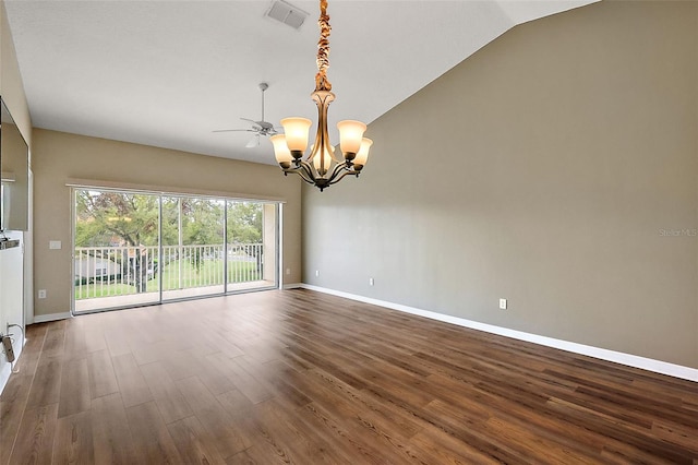 5359 Compass Pt, Oxford, FL 34484 - unfurnished room featuring visible vents, ceiling fan with notable chandelier, baseboards, dark wood-style flooring, and vaulted ceiling