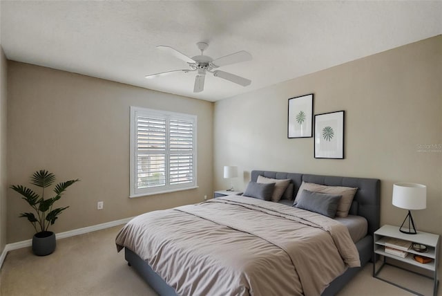 5359 Compass Pt, Oxford, FL 34484 - bedroom featuring ceiling fan, baseboards, and light carpet
