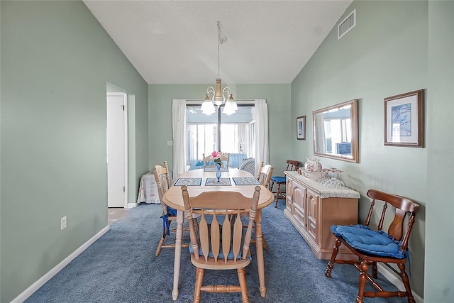 dining space featuring visible vents, baseboards, an inviting chandelier, a textured ceiling, and dark colored carpet