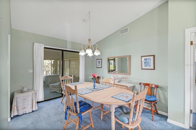 dining room with baseboards, visible vents, high vaulted ceiling, an inviting chandelier, and carpet flooring