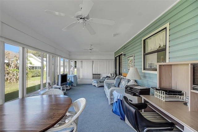 sunroom with a ceiling fan