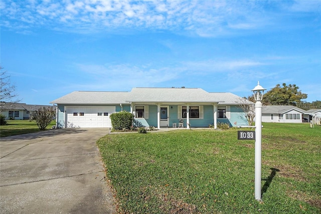 ranch-style home featuring a front lawn, a porch, concrete driveway, and an attached garage