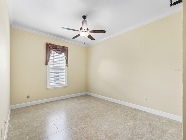 empty room featuring ornamental molding, baseboards, and a ceiling fan