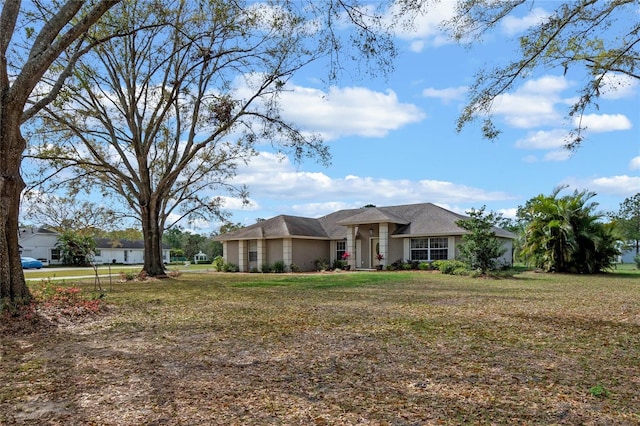 view of front of home with a front yard