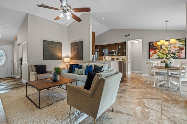 living area with visible vents, baseboards, ceiling fan with notable chandelier, arched walkways, and high vaulted ceiling