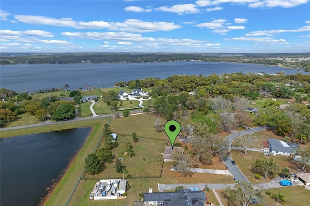 drone / aerial view with a water view