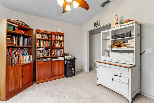 office featuring visible vents, baseboards, light colored carpet, and ceiling fan