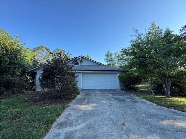 21311 SW Marine Blvd, Dunnellon, FL 34431 - ranch-style house featuring driveway, stucco siding, and a garage