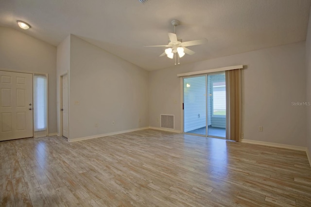 empty room with a ceiling fan, light wood-style floors, visible vents, and baseboards