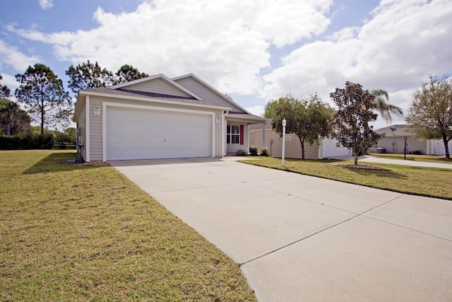 ranch-style home featuring a front yard, a garage, and driveway