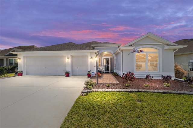 6083 Delphina Loop, The Villages, FL 32163 - ranch-style house featuring roof with shingles, a yard, stucco siding, concrete driveway, and a garage