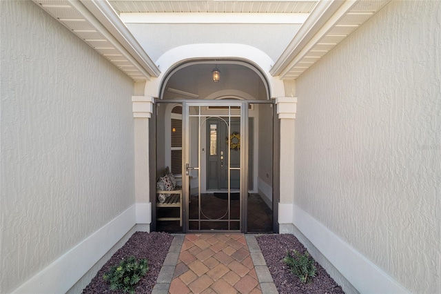 6083 Delphina Loop, The Villages, FL 32163 - view of exterior entry with stucco siding