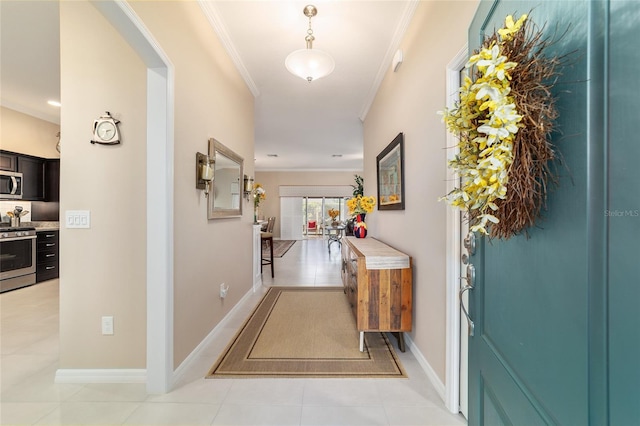 6083 Delphina Loop, The Villages, FL 32163 - hall with light tile patterned flooring, crown molding, and baseboards