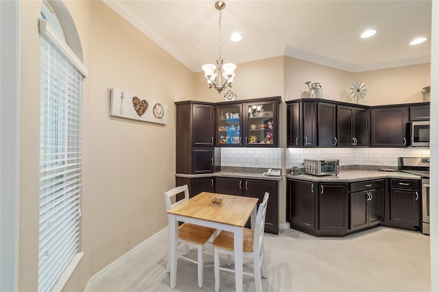 6083 Delphina Loop, The Villages, FL 32163 - kitchen with decorative backsplash, appliances with stainless steel finishes, a chandelier, and ornamental molding