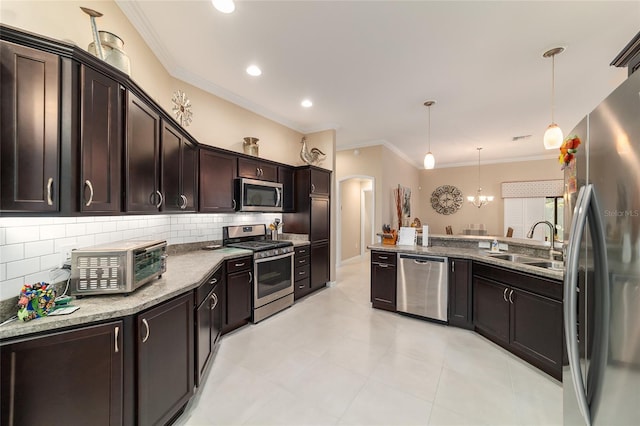 6083 Delphina Loop, The Villages, FL 32163 - kitchen featuring tasteful backsplash, dark brown cabinetry, appliances with stainless steel finishes, arched walkways, and a sink