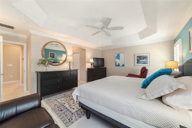 6083 Delphina Loop, The Villages, FL 32163 - bedroom with visible vents, baseboards, ornamental molding, a raised ceiling, and a ceiling fan