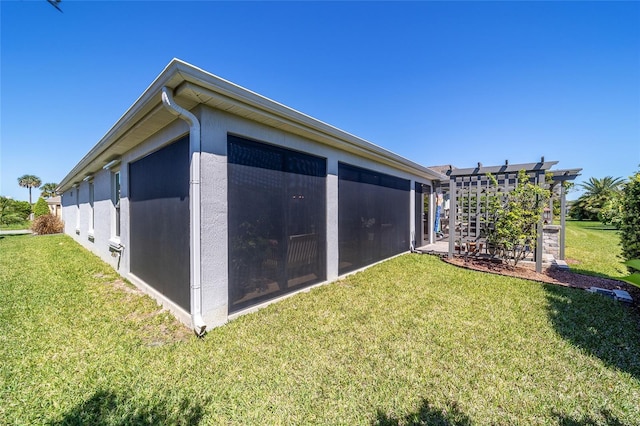 6083 Delphina Loop, The Villages, FL 32163 - view of side of home with a lawn and a sunroom