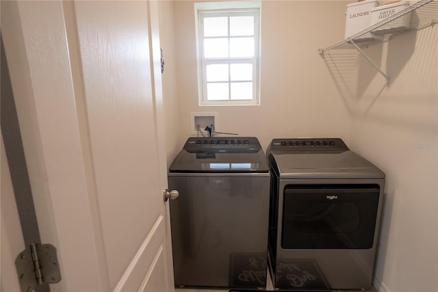 laundry area with laundry area and washing machine and dryer