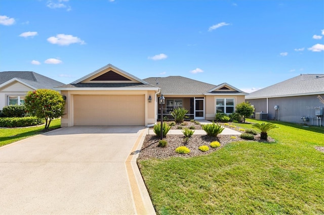 2188 Gordon Path, The Villages, FL 32163 - ranch-style house with stucco siding, concrete driveway, an attached garage, a front yard, and central AC unit