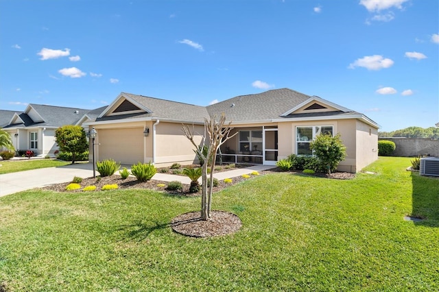 2188 Gordon Path, The Villages, FL 32163 - ranch-style house with concrete driveway, central AC, a front yard, stucco siding, and an attached garage